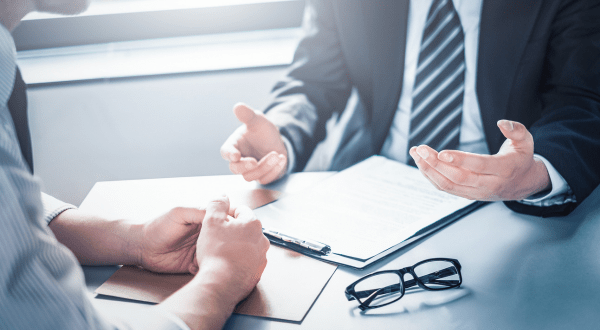 Onderhandelen over salaris met voorbeeldzinnen en tips