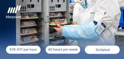 Production worker handling airline catering trays at Gate Gourmet facility at Schiphol, job vacancy via Manpower